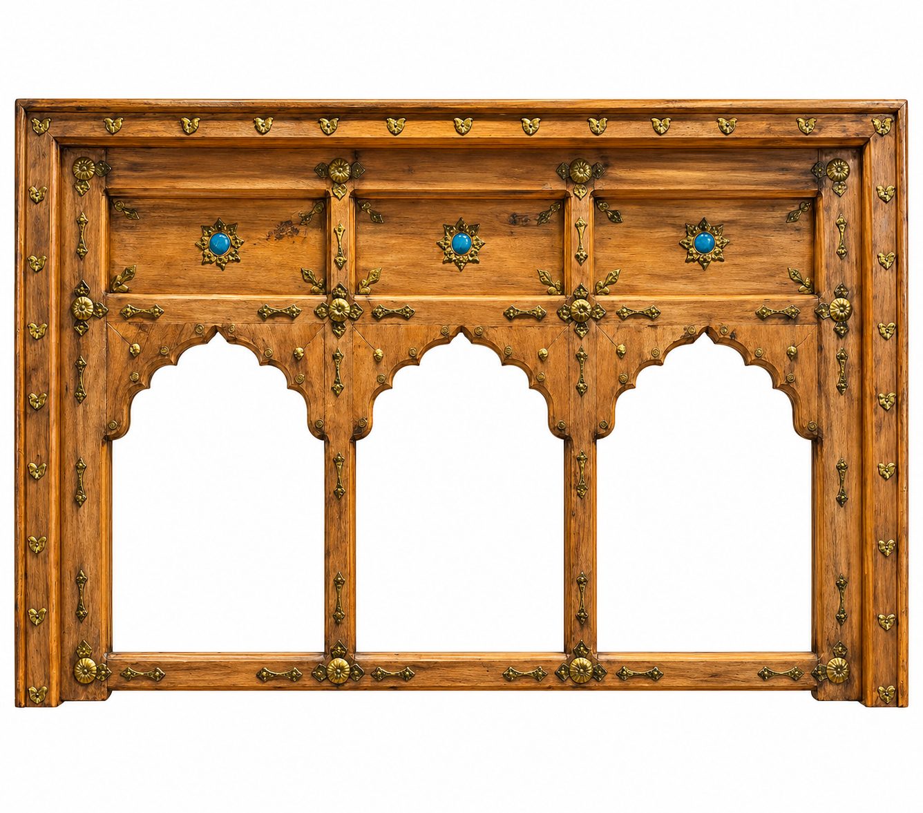 Decorative wooden panel with intricate carvings and blue stones on a white background